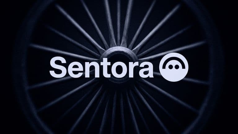 The name Sentora beside the Aave logo in pale blue letters, set over the blurred hub and spokes of a large wheel on a dark navy background.