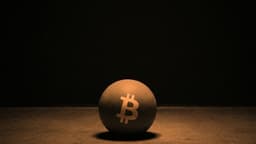 A ball bearing the Bitcoin mark, caught at the moment it strikes a hard floor in a dark empty space.