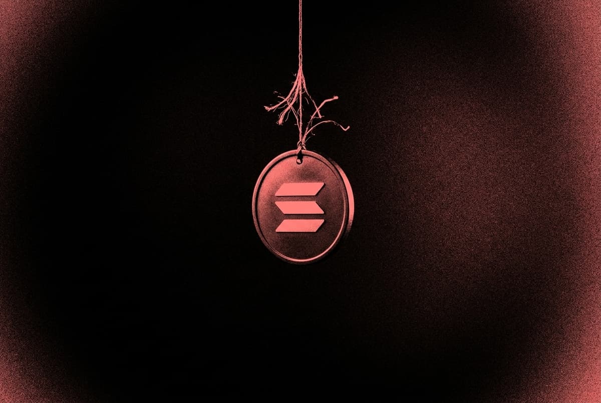 A coin bearing the Solana mark hangs from a single fraying thread above a dark empty drop.
